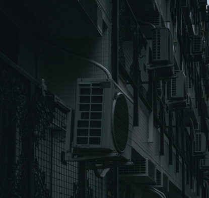 a-building-that-has-a-bunch-of-air-conditioners-on-it.jpg a building that has a bunch of air conditioners on it